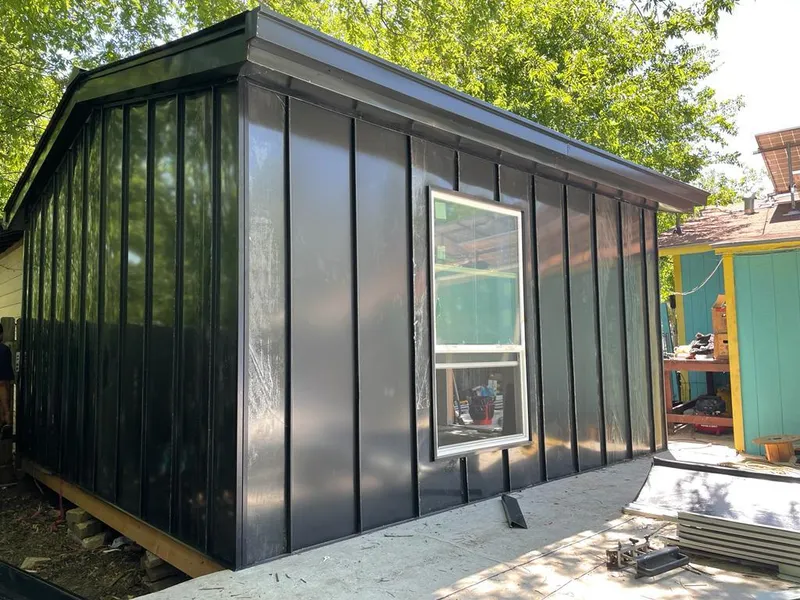 Black standing seam metal wall panels for Metal Roof Installation in Alexandria